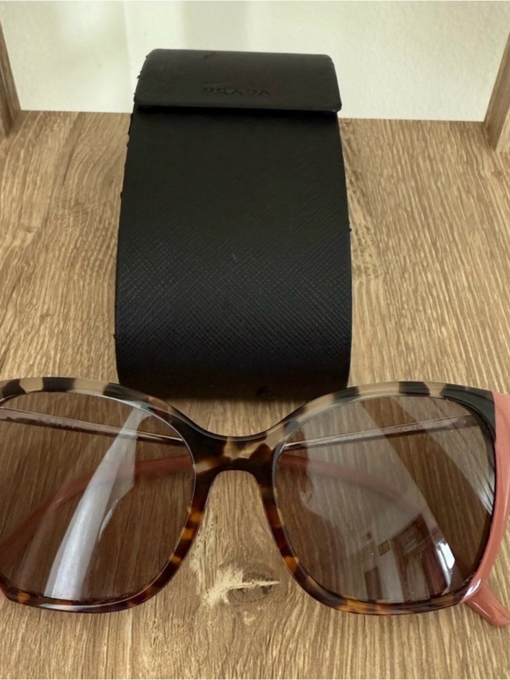 Prada Tortoiseshell Sunglasses with Pink Trim